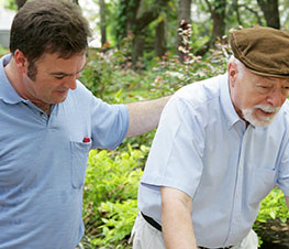 Man Helping Senior